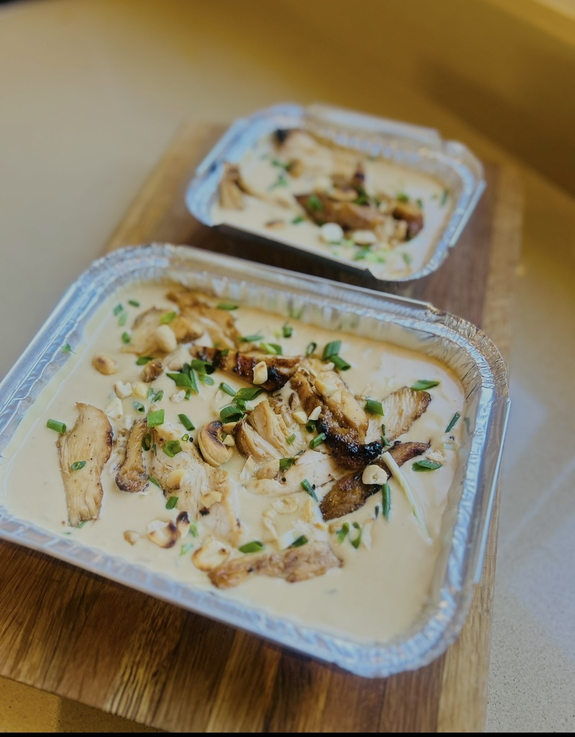 Creamy chicken with mushrooms, cashews and spring onion