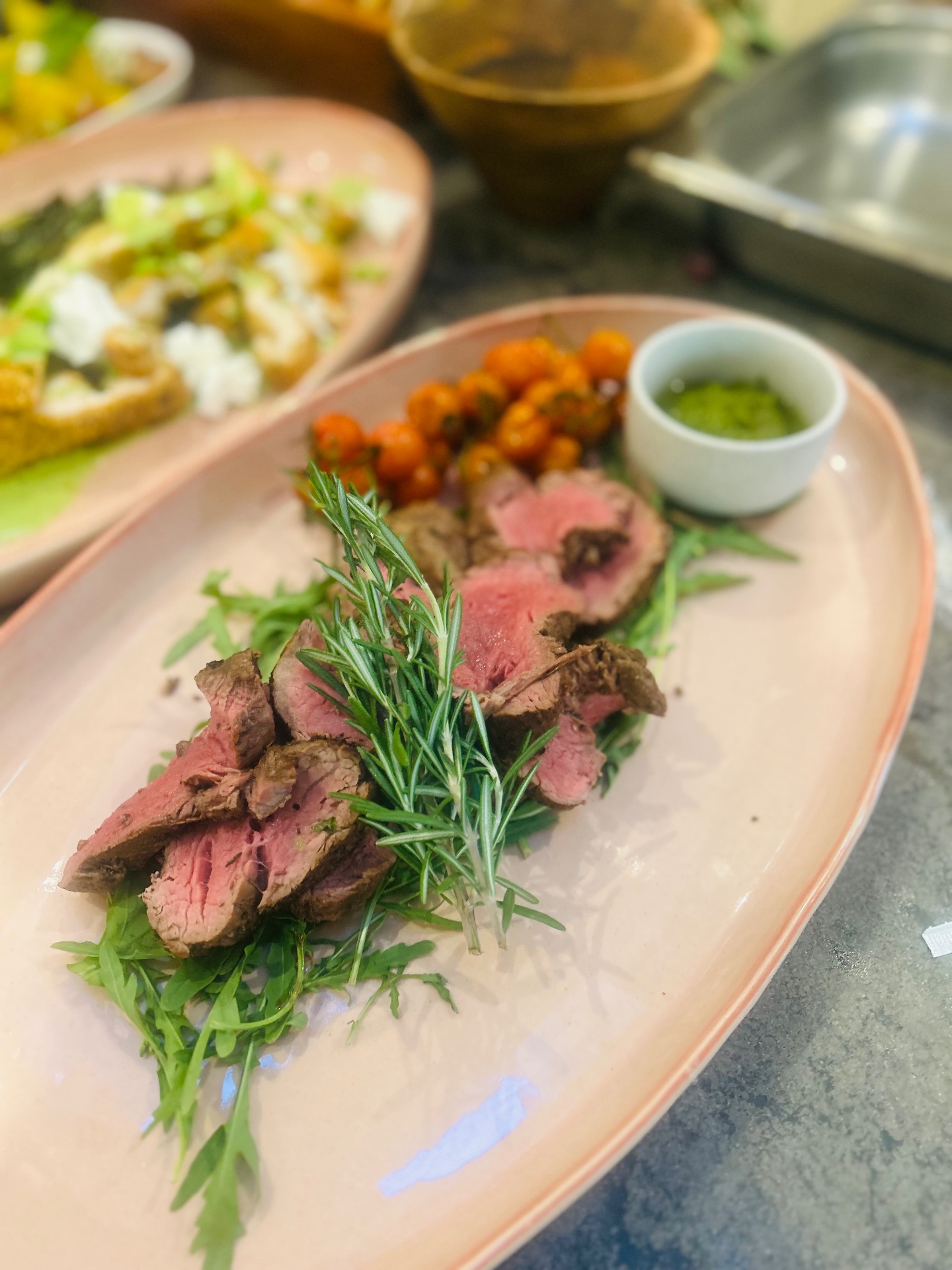 Sliced beef fillet with rosemary