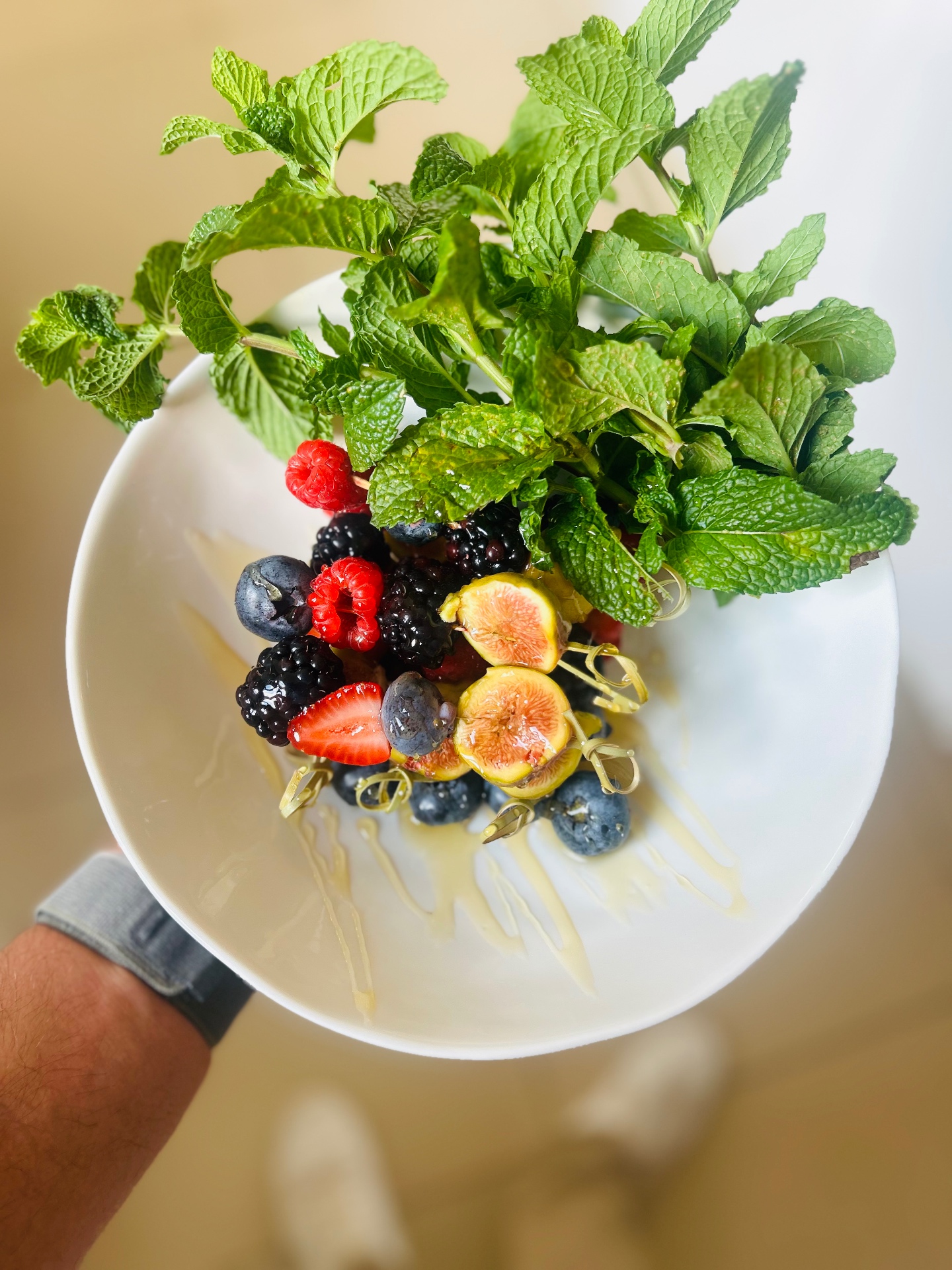 Fresh fig and berry skewers with mint