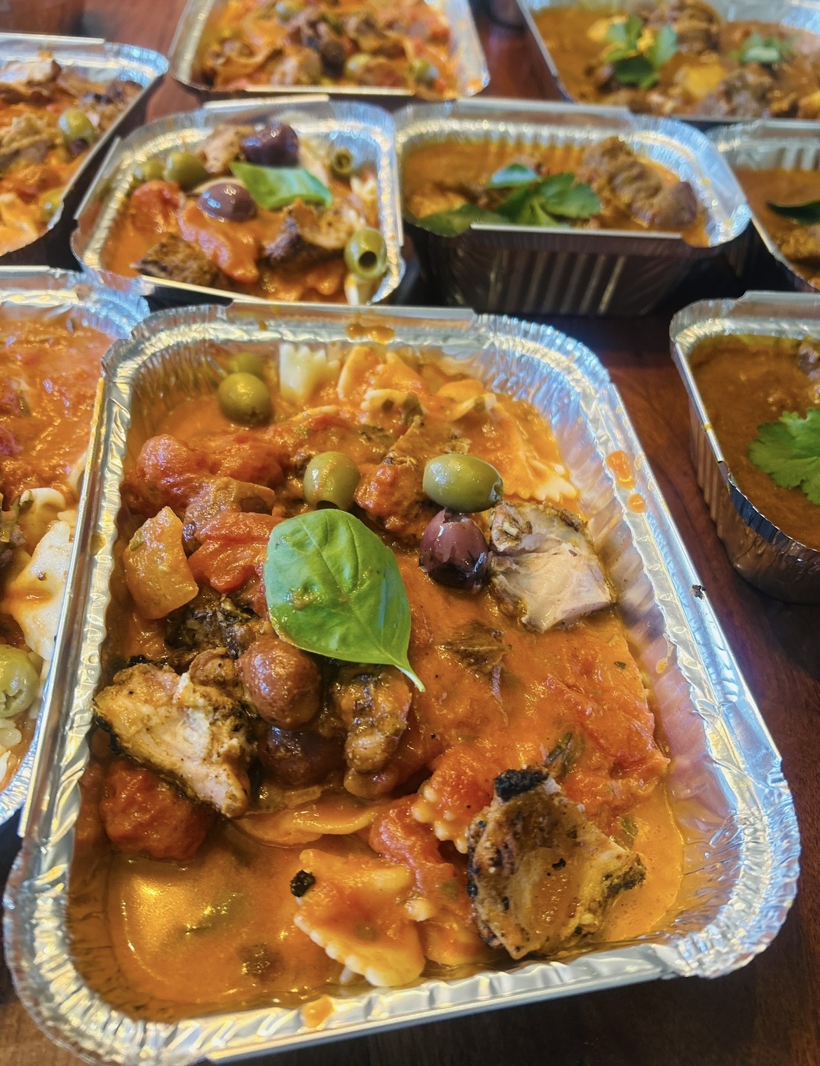 Chicken cacciatore with olives, basil and pasta