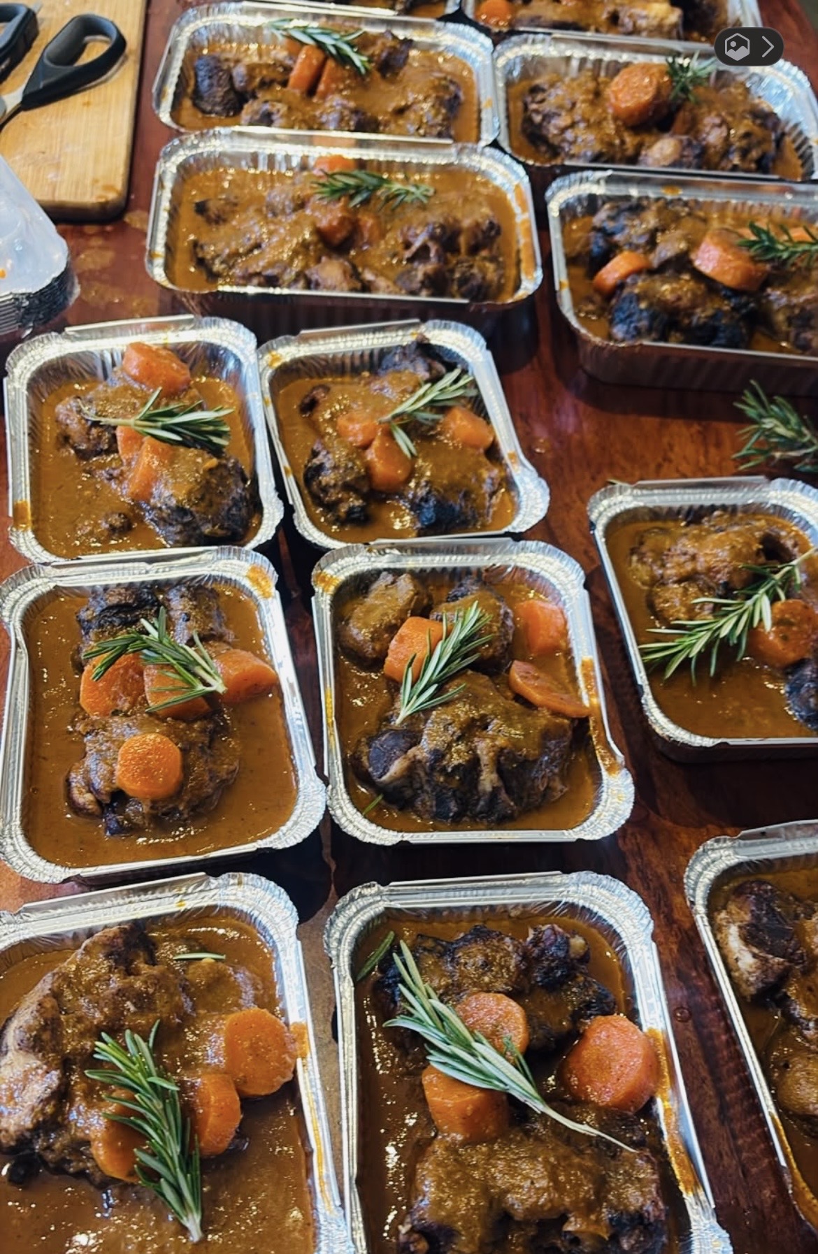 Slow-braised lamb knuckle with carrots and rosemary