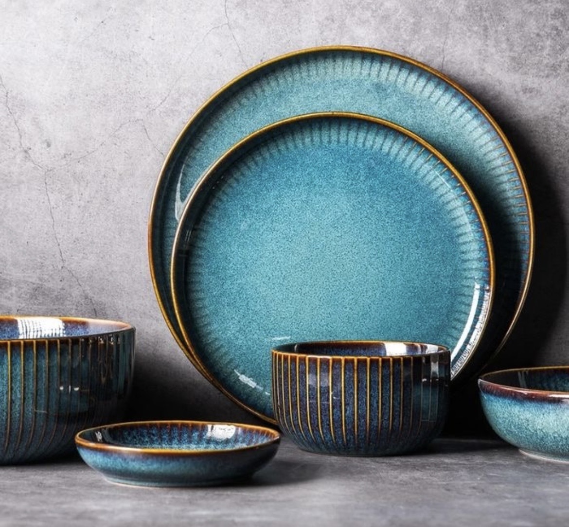 Reactive-glaze blue ceramic plates and bowls